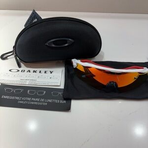 Oakley Sunglasses with Orange Lenses and White Frame